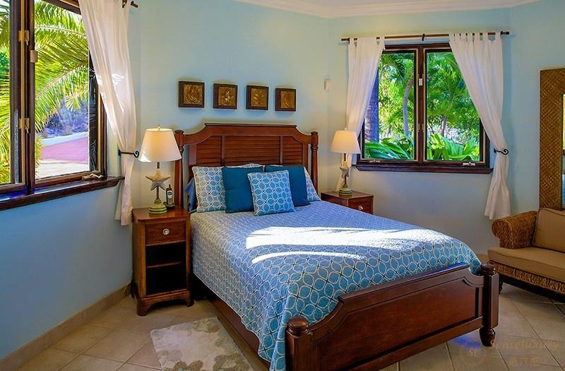 加勒比特克斯和凯科斯群岛三座珊瑚礁别墅卧室